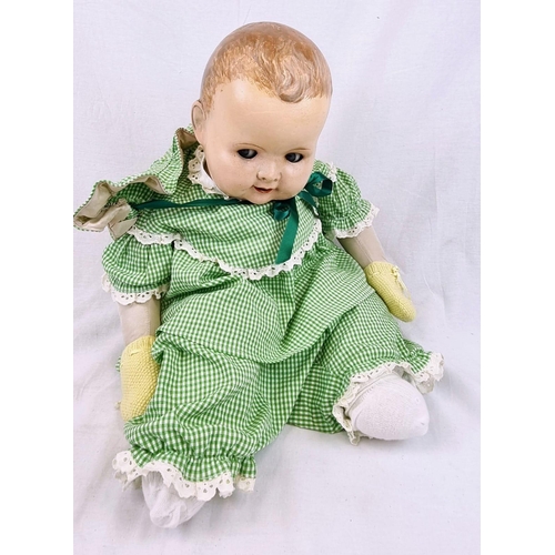 389 - An Original Vintage Possibly Antique German Baby Doll. It has flighty eyes that seem to follow you a... 