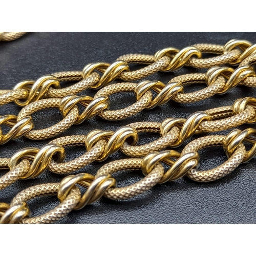 58 - A Sophisticated 14K Yellow Gold Oval and Twisted Link Chain. 86cm long. 12.7g. Lobster clasp. Ref - ... 