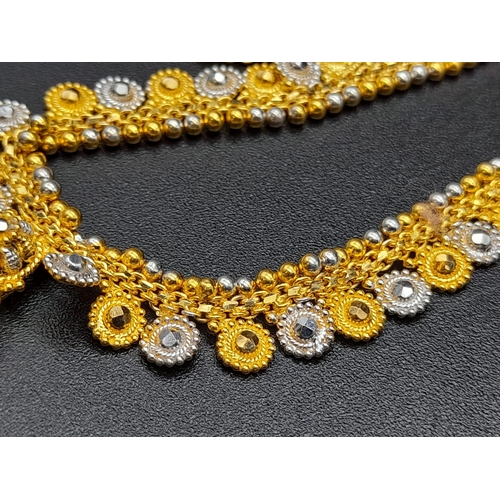 65 - A Glamourous 22k Yellow and White Gold Asian Design Necklace with Hanging Shell Pendant. 3 and 40cm.... 