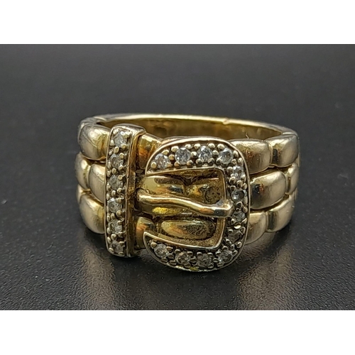 74 - A 9K Yellow Gold and Diamond Buckle Ring. 18 diamonds .25ct complement this keeper piece. Size Q. 9.... 