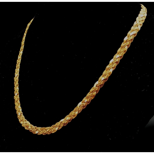 172 - A 21K Yellow Gold Necklace and Bracelet. 44 and 18cm.
28.84g total weight. Slight damage to both ite... 