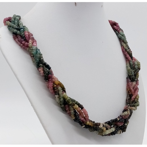 233 - A wonderful, braided, six strand, faceted, multi gem necklace. Length: 59 cm, weight: 94 g. In a pre... 