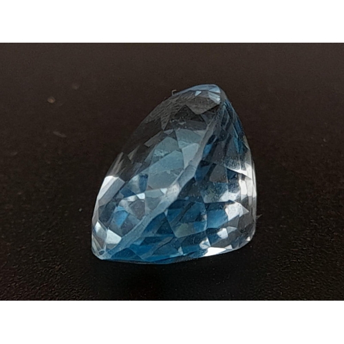 404 - An oval cut faceted blue topaz (9.25 carats) with GLA certificate. Dimensions: 14.02 x 10.62 x 8.28 ... 