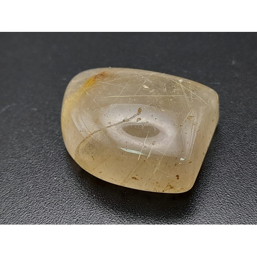 617 - A heavily rutilated quartz (35.90 carats) with GLA certificate. Dimensions: 26.64 x 22.22 x 9.22 mm.... 