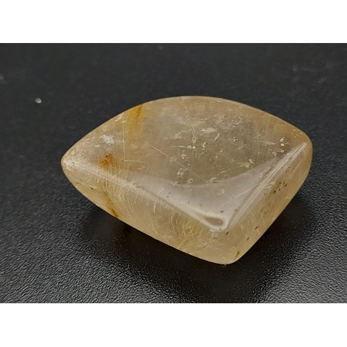 617 - A heavily rutilated quartz (35.90 carats) with GLA certificate. Dimensions: 26.64 x 22.22 x 9.22 mm.... 