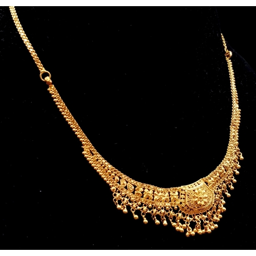 81 - An 21K Yellow Gold Asian Wedding Bridal Necklace. Beautiful filigree work. 34cm. 19.56g. Ref - 8452