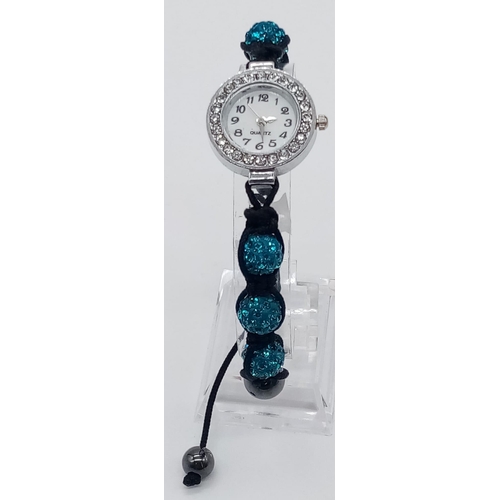 994 - STONE SET AND CRYSTAL BALL MATERIAL STRAP WATCH  AF