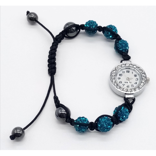 994 - STONE SET AND CRYSTAL BALL MATERIAL STRAP WATCH  AF