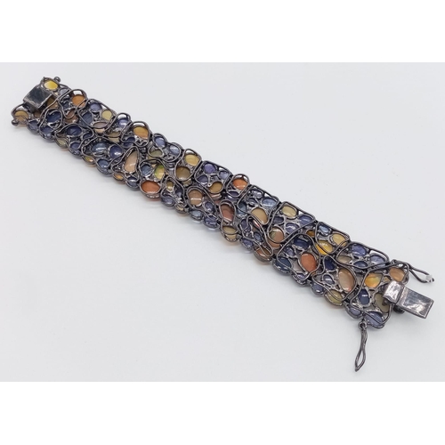 111 - A sterling silver bracelet with opal, amethyst and diamonds. Length: 18 cm, width: 2.8 cm, weight: 5... 