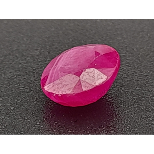 321 - An oval cut faceted ruby (1.95 carats) with GLA certificate. Dimensions: 7.81 x 6.92 x 3.80 mm. Orig... 