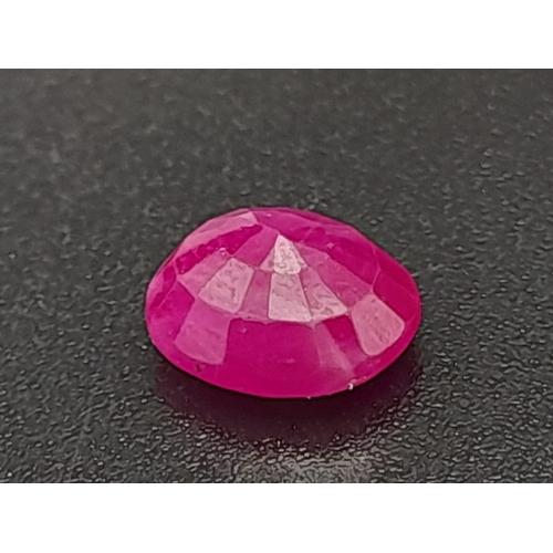 321 - An oval cut faceted ruby (1.95 carats) with GLA certificate. Dimensions: 7.81 x 6.92 x 3.80 mm. Orig... 