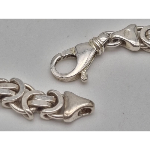 498 - A sterling silver chain necklace. length: 50 cm, weight: 51.96 g.