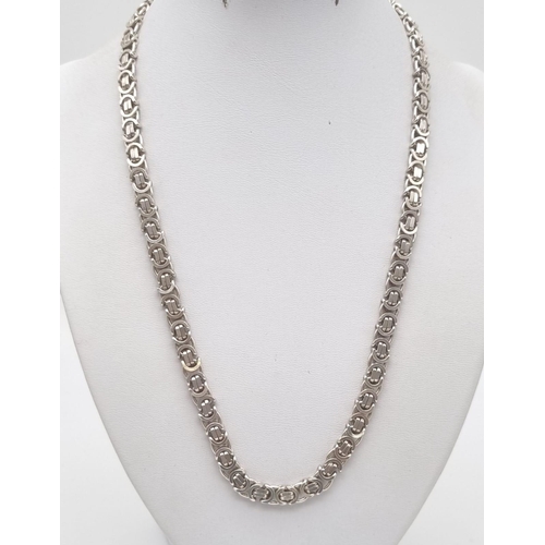 498 - A sterling silver chain necklace. length: 50 cm, weight: 51.96 g.