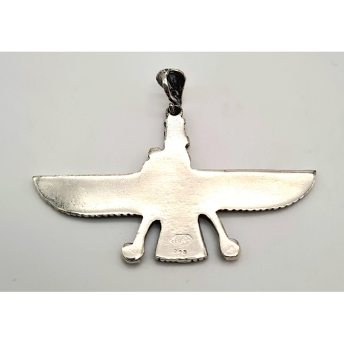 499 - A sterling silver pendant in the form of an ancient Assyrian Deity. Dimensions: 60 x 35 x 3 mm, weig... 