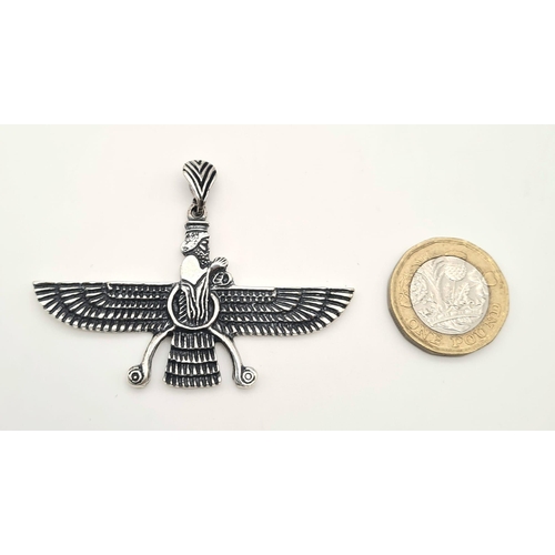 499 - A sterling silver pendant in the form of an ancient Assyrian Deity. Dimensions: 60 x 35 x 3 mm, weig... 