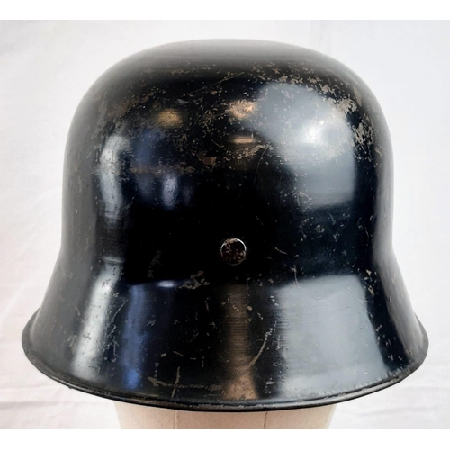 63 - 3rd Reich M18 Pattern Luftshutz Helmet. Surplus WW1 helmets were used during the early days of WW2 f... 