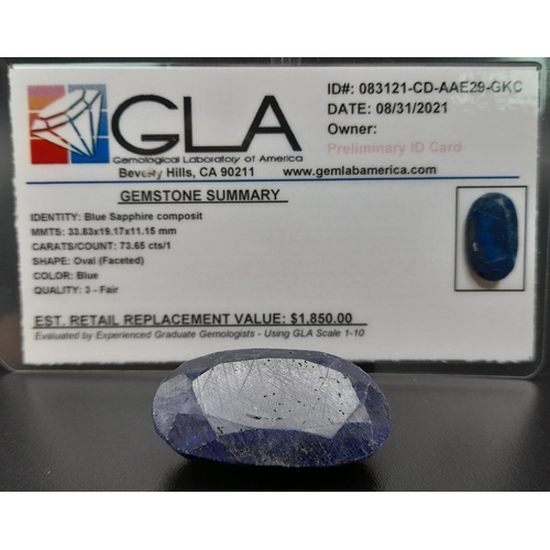 631 - An oval faceted blue sapphire composite (73.65 carats) with GLA certificate. Dimensions: 33.83 x 19.... 