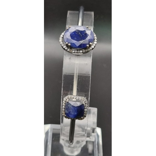 696 - Blue Sapphire Gemstone Bracelet with 10.95cts Sapphires and Diamonds and 1.3cts Diamonds. 12.2 grams... 