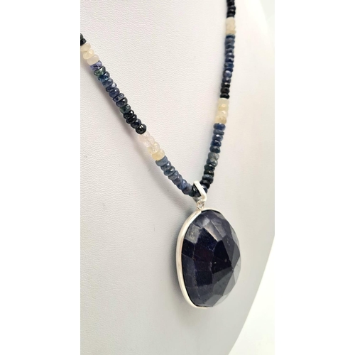 641 - 255cts Blue sapphire single strand with a sapphire pendant in 925 silver, the strand can be worn sep... 