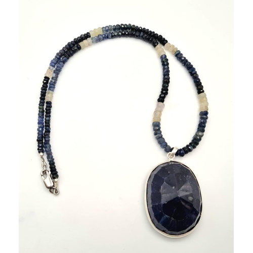 641 - 255cts Blue sapphire single strand with a sapphire pendant in 925 silver, the strand can be worn sep... 