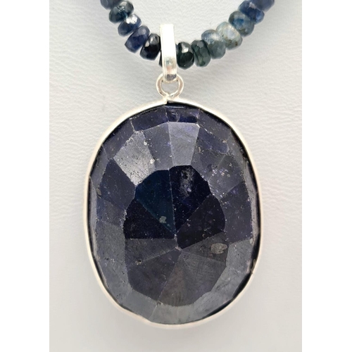 641 - 255cts Blue sapphire single strand with a sapphire pendant in 925 silver, the strand can be worn sep... 