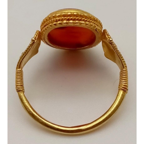 607 - An Ancient Greek Possibly Roman 22K Gold Intaglio Carnelian Agate Ring. Size P. 4g total weight.