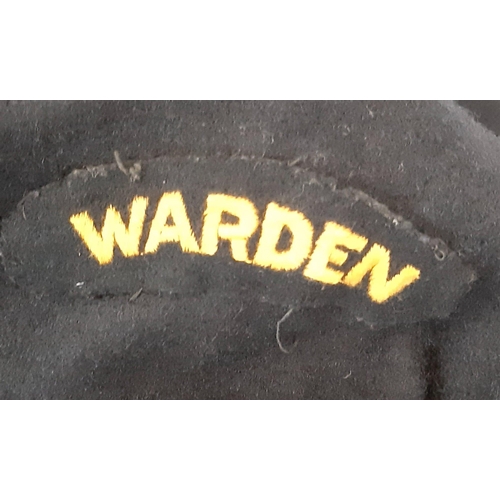 634 - An Original WW2 Civil Defence Air Raid Warden Coat and Helmet. You can just about make out on the W ... 