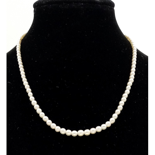 545 - Graduated pearl necklace with unmarked 9ct gold clasp, 36cm in length, total weight 6 grams. largest... 