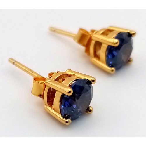 578 - A Pair of Lab-Created Sapphire Earrings set in 925 Gilded Silver.