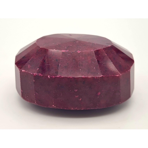 146 - A massive (2,468.45 carats) oval faceted ruby with GLA certificate. Dimensions: 85.31 x 70.03 x 42.9... 