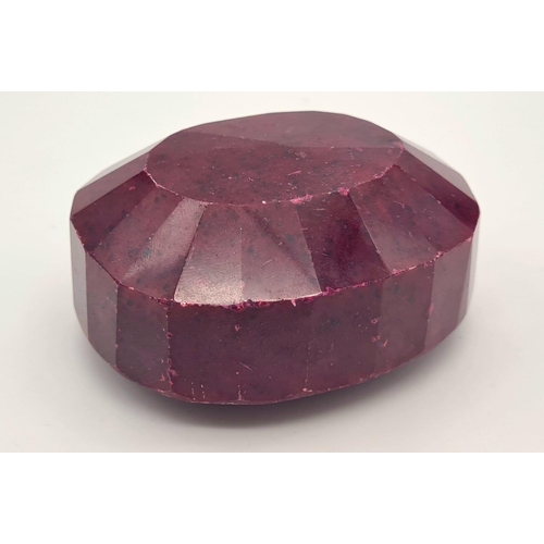 146 - A massive (2,468.45 carats) oval faceted ruby with GLA certificate. Dimensions: 85.31 x 70.03 x 42.9... 