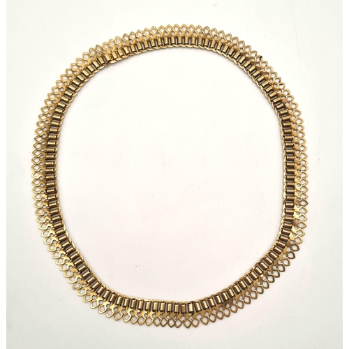 217 - An 18K Yellow Gold Pierced Link Necklace. 42cm. 40.10g.
Ref - 3722.