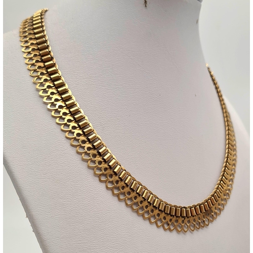 217 - An 18K Yellow Gold Pierced Link Necklace. 42cm. 40.10g.
Ref - 3722.