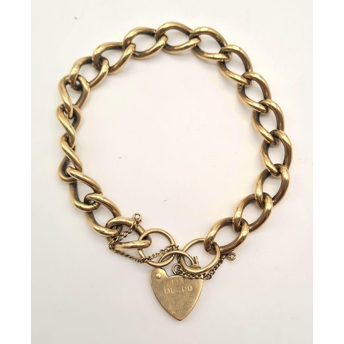 243 - A 9K Yellow Gold Curb-Link Bracelet with Heart Clasp.
20cm. 33g. Ref - 3399.