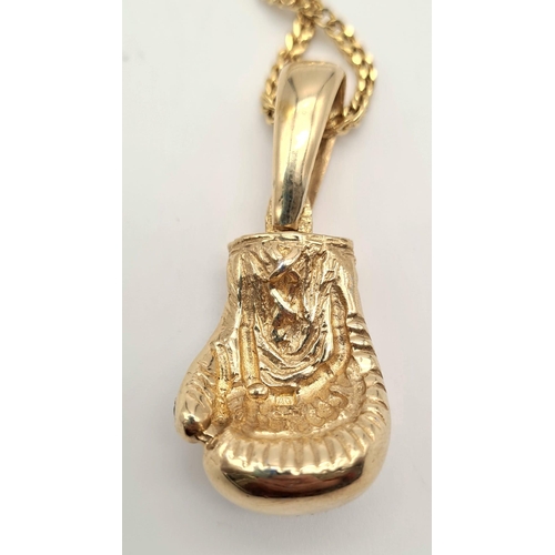 34 - A 9K Yellow Gold Necklace with a 9K Gold White Stone Decorated Boxing Pendant. 4 and 40cm. 32.85g to... 