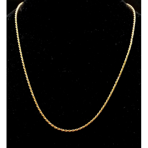 473 - An 18K Yellow Gold Prince of Wales Link Chain - 50cm, small kink, a/f - 10.35g. Plus an 18k yellow g... 