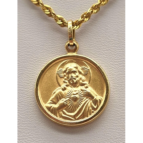 477 - An 18K Yellow Gold Rope Chain with an 18K Yellow Gold Jesus Pendant. 16mm and 44cm. 4.63g. Ref - 959... 