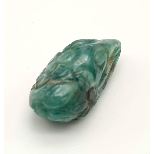 538 - A natural freeform carved emerald (58.85 carats) with GLA certificate. Dimensions: 35.45 x 16.11 x 1... 