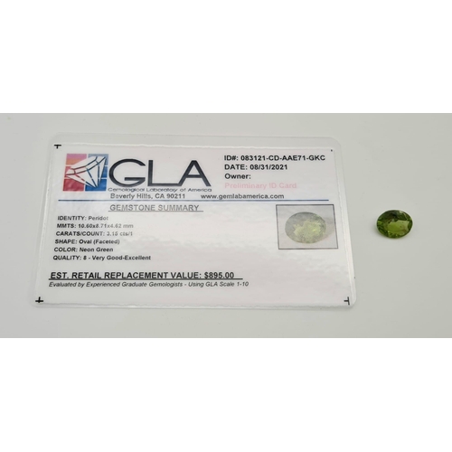 589 - An oval cut peridot (3.15 carats) with GLA certificate. Dimensions:10.60 x 8.71 x 4.62 mm. Original ... 