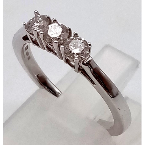 747 - 18CT WHITE GOLD DIAMOND 3 STONE RING 0.30CT 3.5G SIZE M 1/2