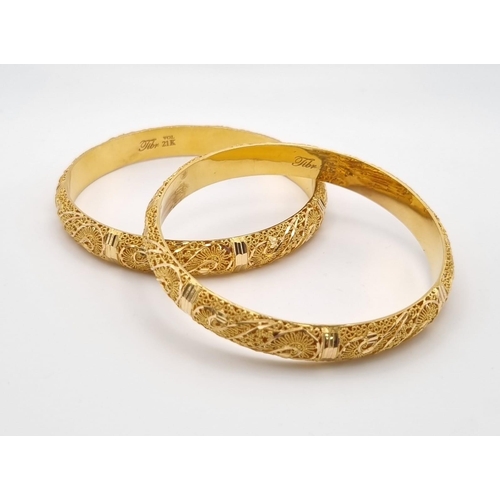 29 - Two 21K Yellow Gold Asian Wedding Filigree Bangles. 7cm inner diameter. 39.42g total weight. Ref - 3... 