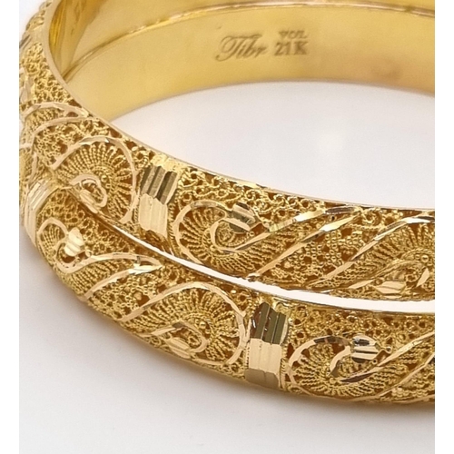 29 - Two 21K Yellow Gold Asian Wedding Filigree Bangles. 7cm inner diameter. 39.42g total weight. Ref - 3... 