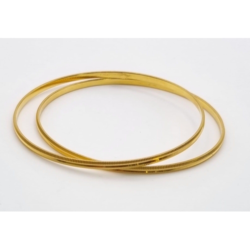 44 - A Mixed Gold Lot: 4 x 22K yellow gold bangle set - 32.55g, 2 x 22k yellow gold bangle set - 16.2g, p... 