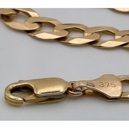 471 - A 9K Yellow Gold Flat Curb Link Bracelet. 19cm. 7.05g.
Ref - 3720.