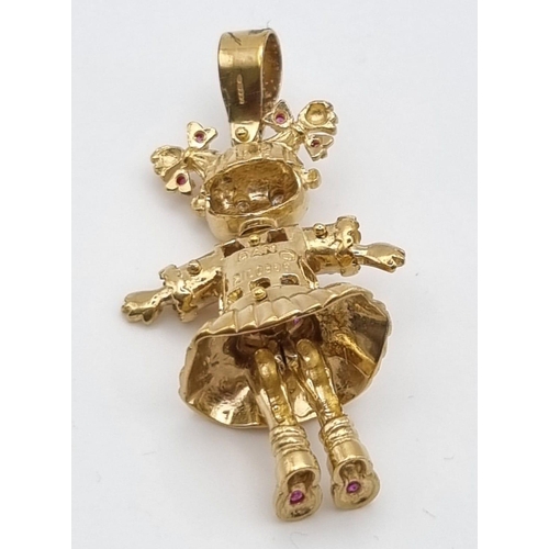 5 - A 9k Yellow Gold Multi-Coloured-Stone Doll Pendant. 5.5cm including attachment. 11.83g total weight.... 