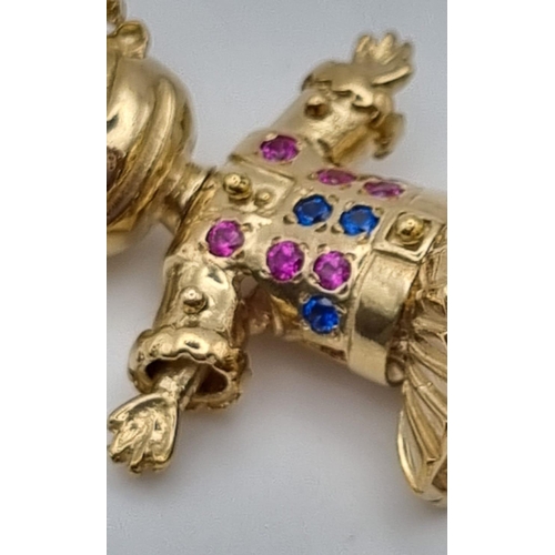 5 - A 9k Yellow Gold Multi-Coloured-Stone Doll Pendant. 5.5cm including attachment. 11.83g total weight.... 