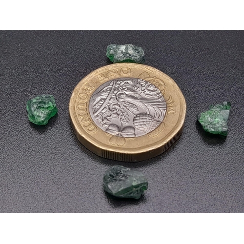 596 - Four rough dioptase pieces (total 6.30 carats) with GLA certificate. Average dimensions: 8.10 x 5.90... 