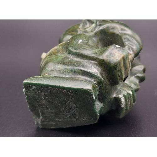 690 - An Early Jade Hand-Carved Figurine. 4cm tall.