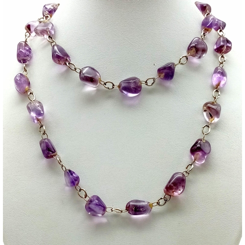 788 - A Lavender Fluorite Rough Beaded Necklace. 70cm.