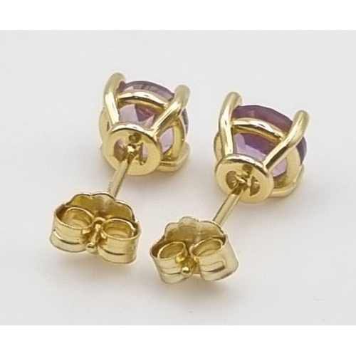 986 - A Pair of 925 Silver Gilded Amethyst Earrings.